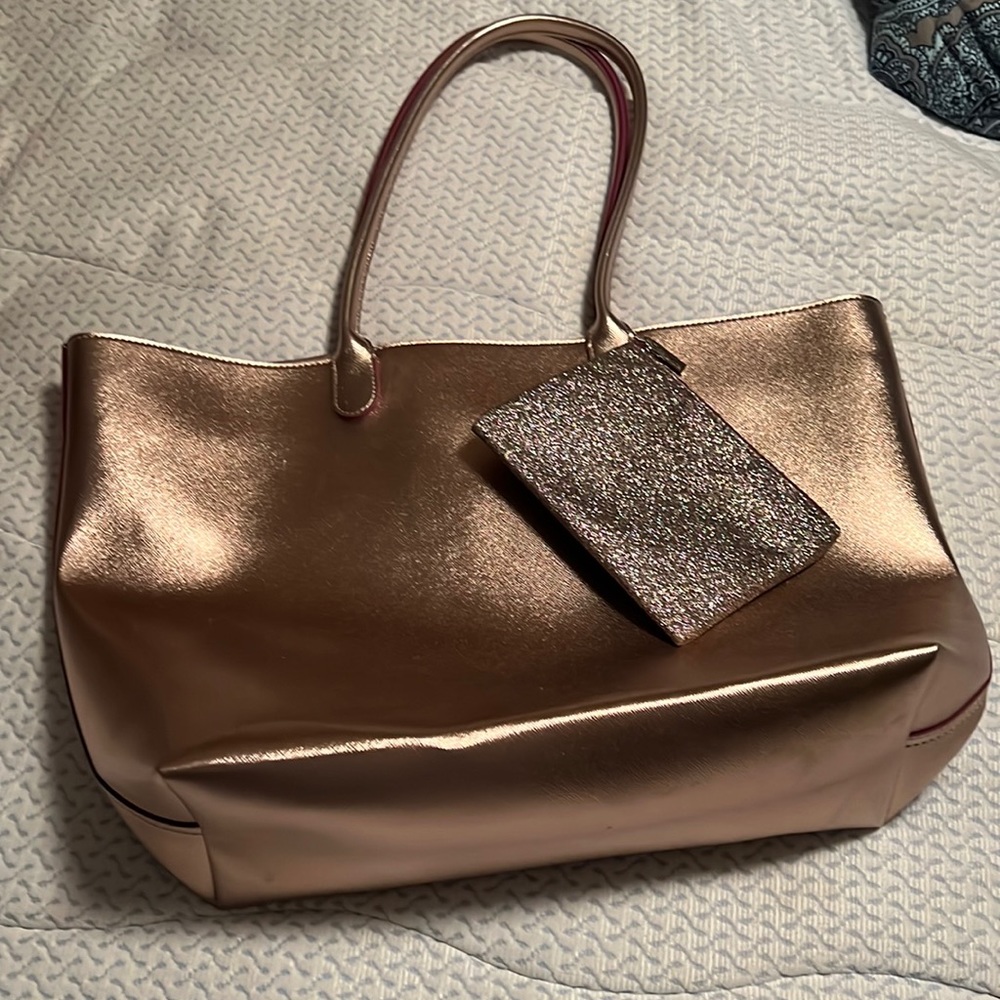 BATH AND BODY WORKS- Pink Metallic bag with pink glitter pouch-never been used